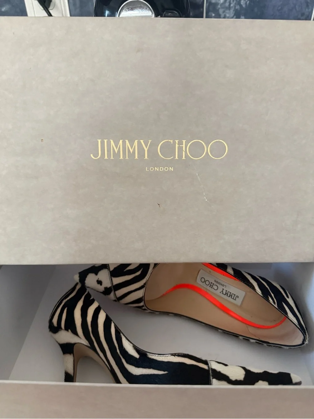 Jimmy Choo Black and White Animal-Print Pointed Pumps with Orange Lining